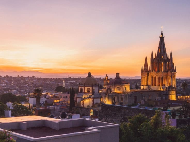 The San Miguel de Allende skyline at sunset, with La Parroquia's tower lit up